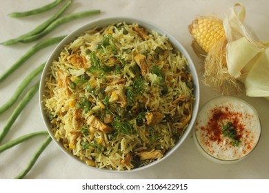 Sweetcorn Chicken Rice. Steamed Basmati Rice Tossed With Sauteed Sweetcorn, Beans And Chicken. A Rice Dish For Lunch Or Dinner. Shot With Opened Corn And On White Background.