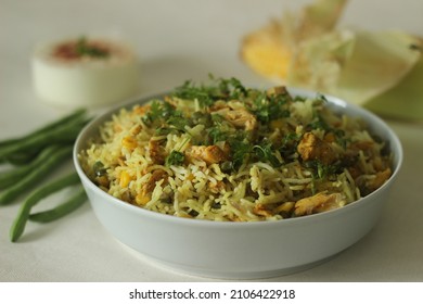 Sweetcorn Chicken Rice. Steamed Basmati Rice Tossed With Sauteed Sweetcorn, Beans And Chicken. A Rice Dish For Lunch Or Dinner. Shot With Opened Corn And On White Background.