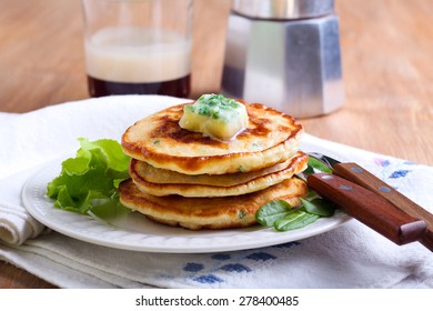 Sweetcorn Pancakes With Herb Butter On Plate