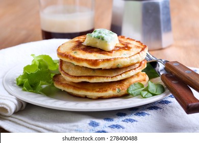 Sweetcorn Pancakes With Herb Butter On Plate