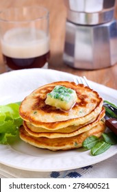 Sweetcorn Pancakes With Herb Butter On Plate