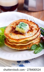 Sweetcorn Pancakes With Herb Butter On Plate