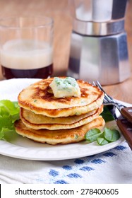 Sweetcorn Pancakes With Herb Butter On Plate