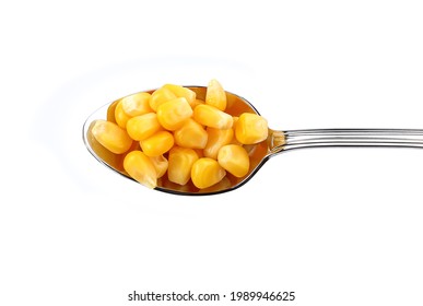 Sweetcorn In A Spoon Isolated White Background