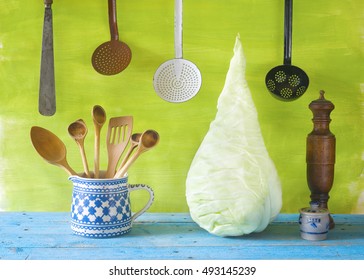 Sweetheart Cabbage And Old Kitchen Utensils