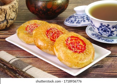 A sweetheart cake (Lao Po Bing) or wife cake or marriage pie is a traditional Cantonese pastry with a thin crust of flaky pastry. (Red Chinese word “Fu” on cake mean “Happiness”)
