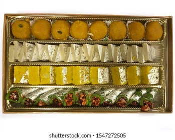 Sweets Box From India, A Special Gift And As This Kind Of Dessert & Sweets Are Made For Special Celebration Or Festival Such Diwali, Ganpati Combine With Ladoo, Kaju Katli, Mysore Pak And Anjeer Roll.