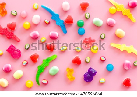 Sweets pattern on pink background top view