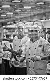 Sweileh, Amman, Jordan - December 15, 2018 : Two Workers Smiling While Making Shawarma, An Arabic Popular Sandwich