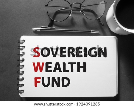 SWF Sovereign wealth fund, text words typography written on book against dark background, life and business motivational inspirational concept