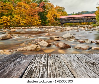 Swift River and old covered Albany Bridge at autumn in White Mountain National Forest, New Hampshire, USA. Fall in New England. 
