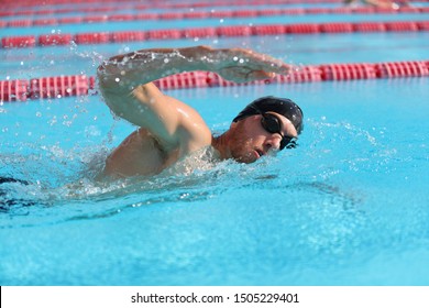 Swim triathlon competition training man athlete swimmer in outdoor lane swimming . Sport and fitness active athletes. - Powered by Shutterstock