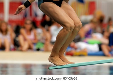 Swimmer launched into water in a diving competition - Powered by Shutterstock