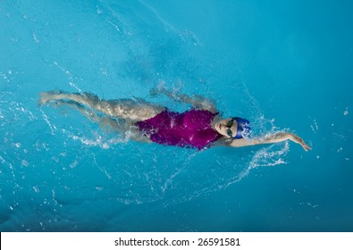 Swimmer In Mid Backstroke Shot From Above