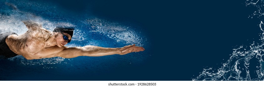 Swimmer on dark background. Sports banner. Horizontal copy space background