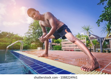 Swimmers to do warmup before swimming in the pool. - Powered by Shutterstock