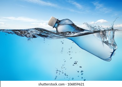  Swimming Bottle Of Water In Water On Sky Background