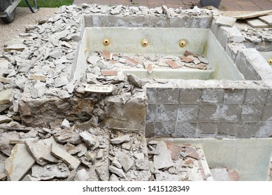 Swimming Pool Being Demolished With Jack Hammer For Remodel And New Tile And Coping And Plaster