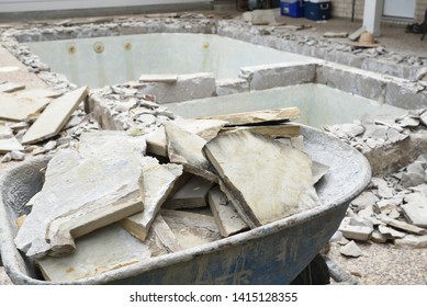 Swimming Pool Being Demolished With Jack Hammer For Remodel And New Tile And Coping And Plaster