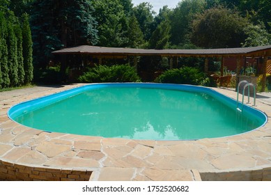 Swimming Pool With Blue Water In The Back Yard, Copy Space