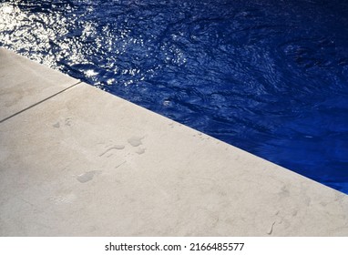 Swimming Pool Blue Water With Grey Gray Pavers Tiling