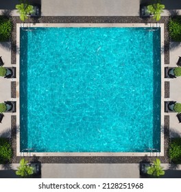 Swimming Pool Blue Water In Summer Top View Angle. Aerial View Images Of Swimming Pool In A Sunny Day Which Suitable For Sport Or Relax On Vacation Time Or Workout For Burn Some Calories In Holiday.