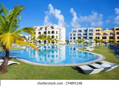 Swimming Pool By The Luxury Resort Hotel Buildings