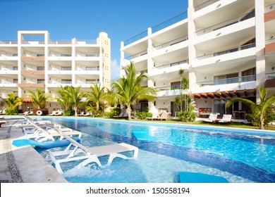 Swimming Pool At Caribbean Resort. Exotic Garden.