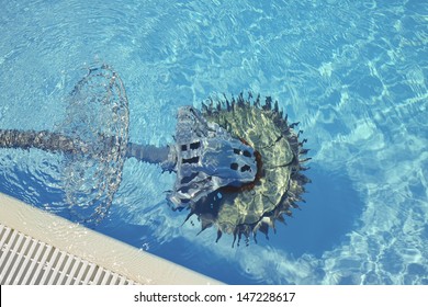 Swimming Pool Cleaner Robot Immersed In Water