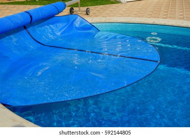 Swimming Pool With Cover From Dirt And Isolation.