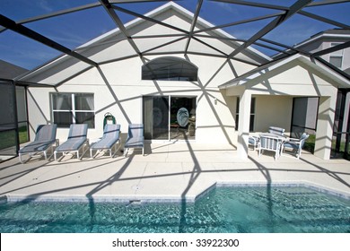 A Swimming Pool And Lanai In Florida