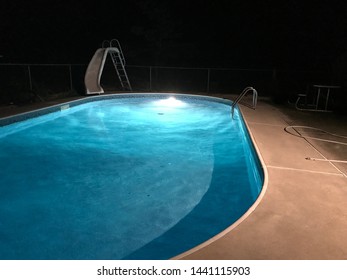 Swimming Pool With Light At Nighttime 