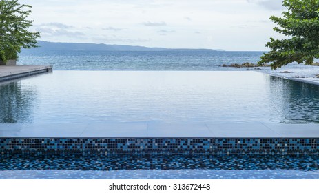 Swimming Pool Near The Beach At High Class Resort In Thailand