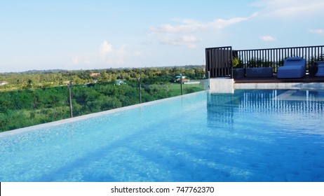 The Swimming Pool On Rooftop At Luxury Hotel