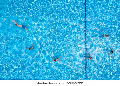 Swimming Pool With Playing People, Overhead View