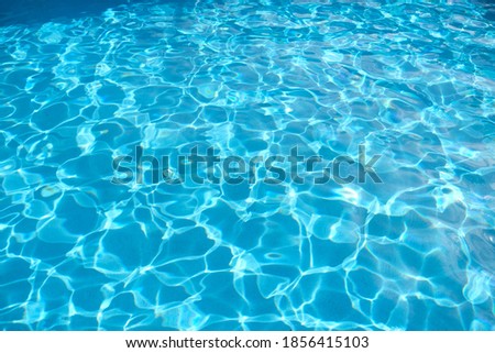 swimming pool reflection with sunlight
