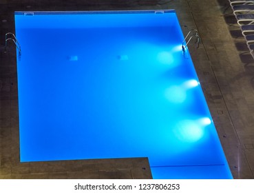 Swimming Pool Seen From Above At Night.