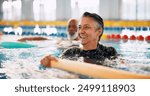 Swimming pool, senior people and woman with smile, exercise and water aerobics for fun. Pensioner, retirement and mature lady with fitness, wet and liquid with training, wellness and healthy with joy