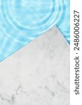 Swimming pool water background with marble table top,Summer background nature sea blue water texture wave with sunlight reflection,Blank Backdrop Luxury podium srage mock up for cosmetics banner
