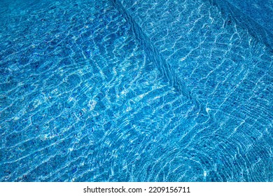 Swimming Pool Water Sunny Reflection Background. Ripple Poolside Water, Backdrop. Summer Fin Recreational Outdoor Activity Concept Design. Blue Water Texture