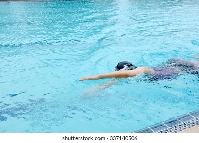 swimming practise in pool