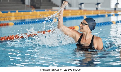 Swimming, success or happy winner in celebration for achievement in race or pool competition. Fitness, wellness or excited woman swimmer winning sports game with victory or championship performance - Powered by Shutterstock