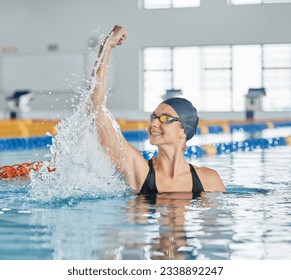 Swimming winner, success or happy woman in celebration for achievement in race or pool competition. Fitness, smile or excited girl swimmer winning sports game with victory or championship performance - Powered by Shutterstock