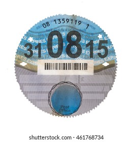 SWINDON, UK - AUGUST 2, 2016: Old UK Car Tax Disk On A White Background