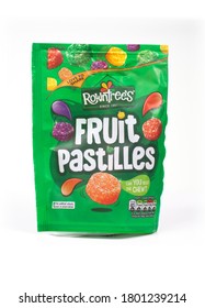 SWINDON, UK - AUGUST 22, 2020: Packet Of Nestle Rowntrees Fruit Pastilles On An Isolated Background