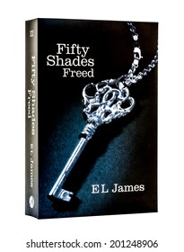 SWINDON, UK - JUNE 27, 2014: Erotic Romance Novel Fifty Shades Freed By EL James on a White Background, Fifty Shades topped best-seller lists around the world, including the UK and USA