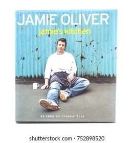 SWINDON, UK - NOVEMBER 11, 2017: Jamie Olivers Jamiies Kitchen Cook Book On A White Background