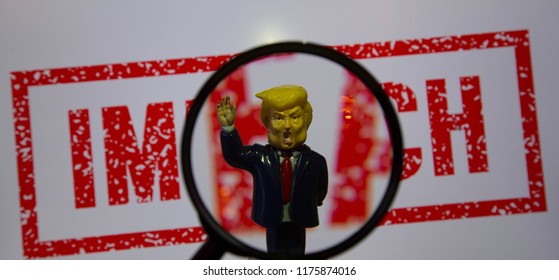 Swindon, Wiltshire, UK, Sept 2018. Trump Bobble Head Figure With A Screw In Hand On White Background With The Word Impeach In Red.