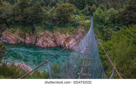 Swing bridge over Buller river gorge, West Coast, New Zealand