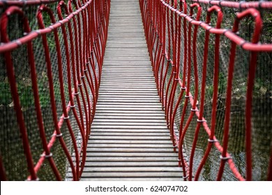 Swing bridge to walk in urban setting